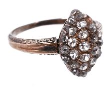 A diamond ring, the marquise shaped panel set with a cluster of old cut...  A diamond ring,   the