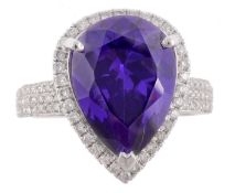 An amethyst and diamond ring, the pear shaped amethyst, estimated to weigh 9  An amethyst and