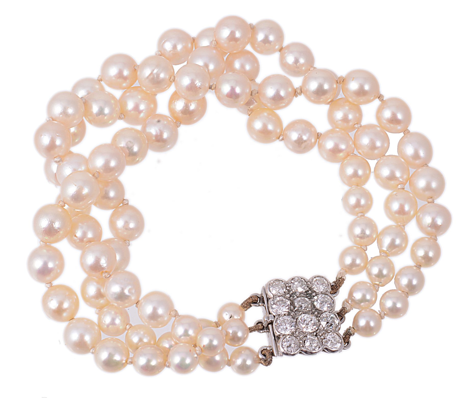 A cultured pearl graduated three strand bracelet  A cultured pearl graduated three strand bracelet,