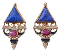 A pair of ruby and lapis lazuli ear clips  A pair of ruby and lapis lazuli ear clips,   the oval