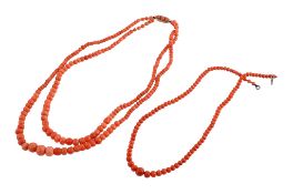 Two coral necklaces , the first with two graduated strands to a gold coral...  Two coral