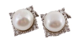A pair of cultured pearl and diamond ear clips, the 12  A pair of cultured pearl and diamond ear