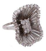 A diamond ring, set with a central cluster of brilliant cut diamonds within...  A diamond ring,