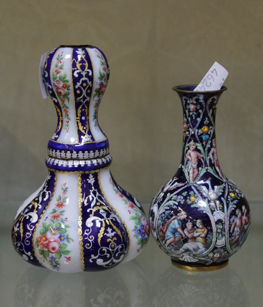 A small Limoges enamel bottle vase decorated in the renaissance style and another enamel vase