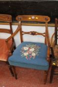 A George III mahogany open armchair with needlework seat There is no condition report available on