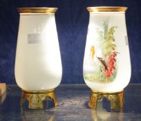 A pair of late 19th French opaque-white glass vases painted with birds. There is no condition report