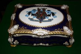 A Paragon China Ltd commemorative porcelain cigar casket and cover to commemorate the centenary of