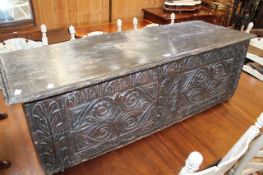 A 17th Century oak carved coffer 130cm length There is no condition report available on this lot