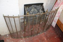 A brass mounted fire grate to include a fireguard There is no condition report available on this