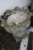 A pair of reconstituted stone urns together with a further trough (3) There is no condition report