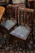 A set of six Sheraton style mahogany dining chairs. There is no condition report available on this