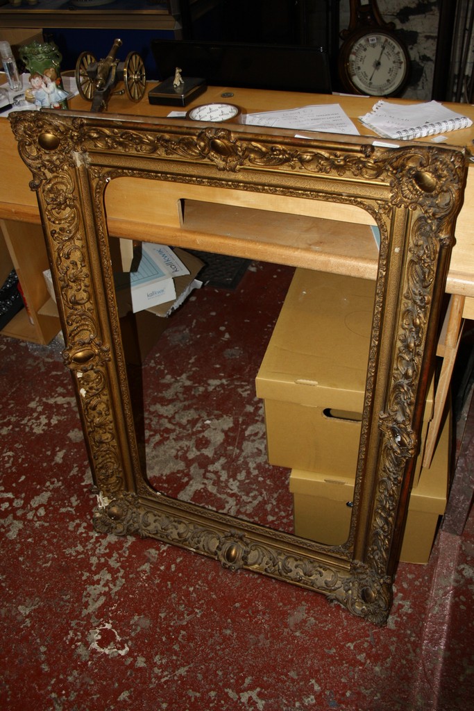 A Louis XV style Gilt composition frame overall dimensions: 28 ½ x 40 1/2 in., 72.4 x 102.9 cm;