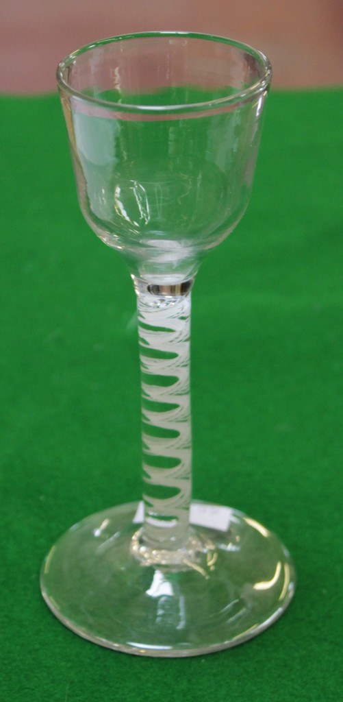 An opaque-twist wine glass, the ogee bowl supported on a double series stem