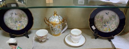 A Paris porcelain (La Courtille) gilt-ground two-handled cup and cover painted en grisaille with