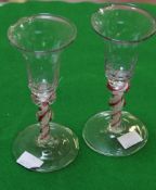 A pair of Low Countries colourtwist wine glasses, with bell bowls supported on knopped