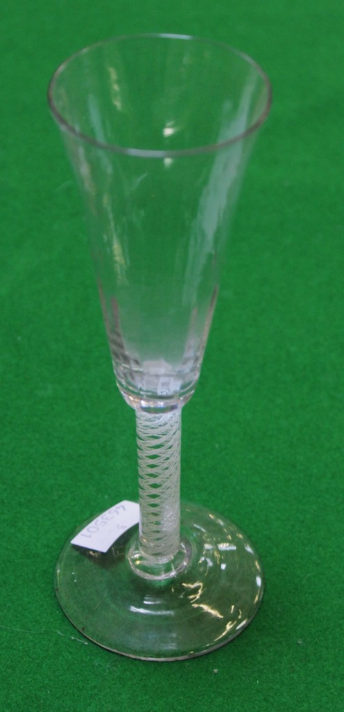 An opaque-twist ale flute drinking glass