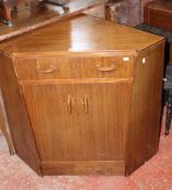 A 1930`s corner writing cabinet with slide out stationery There is no condition report available