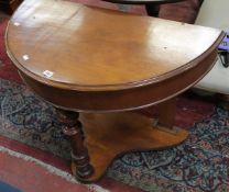 A Victorian mahogany demi-lune side table, 92cm wide There is no condition report available on