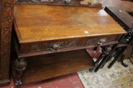 A late Victorian oak side table with two frieze drawers and an undertier 107cm wide A condition