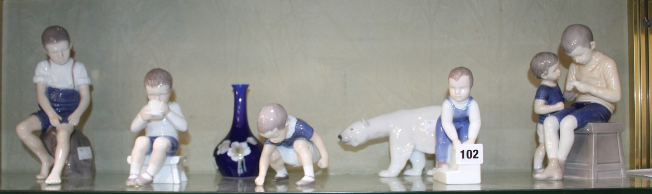 Five various Bing & Grondahl figures; a Royal Copenhagen model of a polar bear and a Bing & Grondahl