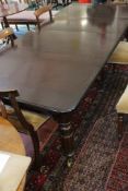 A Victorian style mahogany dining table with two leaves 260cm length