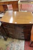 A mahogany bowfront chest with two short and two long drawers, 19th century 74cm wide There is no