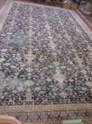 A North West Persian style blue ground rug with stylized decoration 409 x 630cm, distressed There is