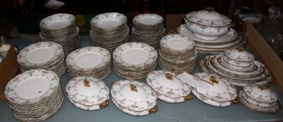 A Limoges dinner service floral pattern stamped Bernardaud & Co dinner plates, side plates, tureens,
