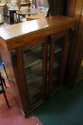 A late 19th Century mahogany side cupboard, 122cm high, 80cm wide There is no condition report