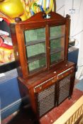 An early 19th century mahogany side cabinet 165cm high, 89cm wide