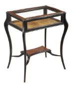 A late Victorian mahogany and inlaid bijouterie table, circa 1900, the shaped lift top with floral