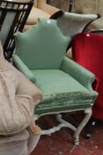 A white painted dressing table chair with hoof feet and a small 17th century style armchair There is