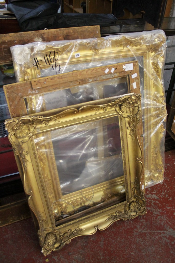 Three gilt composition frames in Louis XV style overall dimensions: 38 x 46 in., 96.5 x 116.8 cm;