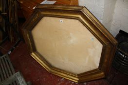 An octagonal gilt cushion frame overall dimensions: 40 1/2 x 45 in., 102.8 x 114.3 cm There is no