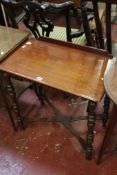 An Edwardian mahogany two tier table, a mahogany and caned stool, A Victorian mahogany two tier