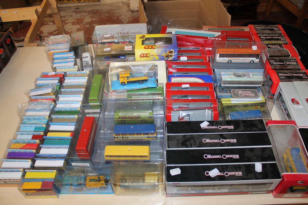 A quantity of various 1:76 scale die cast buses and coaches and others. There is no condition report