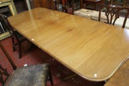 A reproduction mahogany twin pedestal dining table 260cm extended