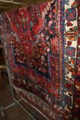 A Middle Eastern rug 137 x 217cm There is no condition report available on this lot.