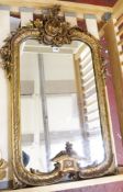 A 19th century giltwood and gesso mirror 92cm high, 58cm wide and three further gilt mirrors (4)