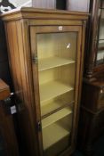 A stained mahogany and glazed vitrine cabinet, circa 1910 173cm high, 63cm wide There is no