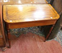 A 19th Century mahogany and rosewood crossbanded card table with turned legs 86cm wide There is no