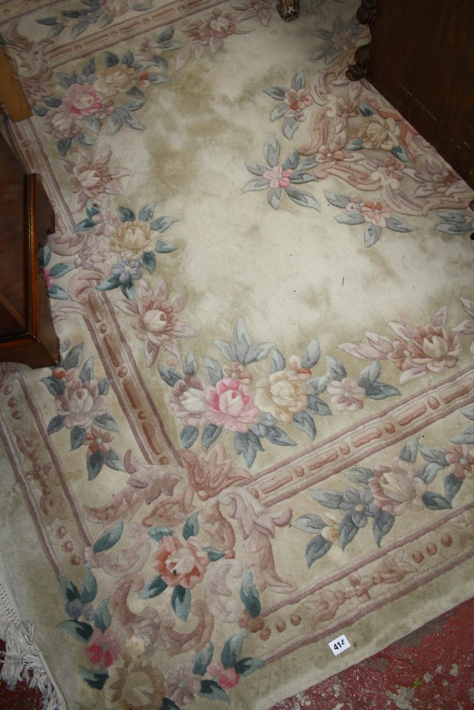 A Chinese wool carpet 280 x 184cm There is no condition report available on this lot.