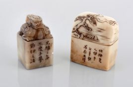 A jade ?dragon? seal, of cube form surmounted by a ferocious dragon-headed turtle, inscribed to one