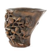 A bamboo libation cup, 17th-18th century, finely carved around the exterior with intricate