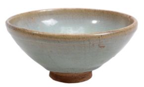 A Jun bowl, Yuan dynasty, of typical conical form standing on a slightly splayed foot and with