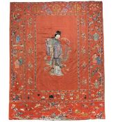 A large red silk ground commemorative hanging, 19th century, embroidered with Magu serving the