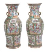 A pair of Canton Export vases, 19th century, each of inverted baluster form with splayed foot,