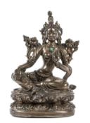 A gilt bronze figure of Tara, Tibet, 16th-17th century or later, seated in lalitasana on a raised
