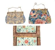 Three Chinese silk purses, early 20th century, finely embroidered with intricate blooming flowers