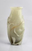 A jade vase, 18th century, of flattened tall ovoid form carved with veining to represent a large,
